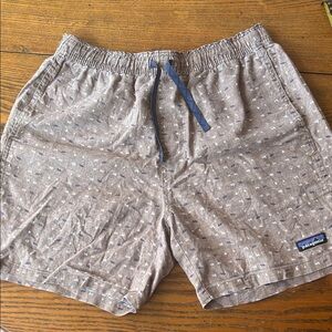 Patagonia medium Men's tan print with small blue dinosaurs; hemp/cotton blend